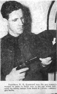 This photo appeared in the Dayton Daily News the morning of the shooting. It was captioned: &quot;Patrolman W.H. Hammond uses the gun-woman&#39;s weapon to point to bullet hole in his cap which indicates he narrowly escaped death in Calvary Cemetery gun battle.&quot; Hammond had a short career with the Dayton police, 1939 to 1943.   (Newspaper clipping obtained with help from Dayton Metro Library’s Special Collections Division)